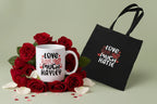 White mug with "Love You So Much" personalized text beside black tote bag with matching print