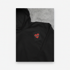 Black hoodie with small red heart patch 'VIOLET' on the upper chest