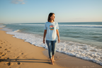 Light blue crew-neck T-shirt with circular Save Our Seas ocean sunset logo