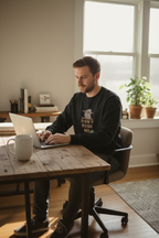 Black sloth graphic sweatshirt worn by man, “DON’T RUSH ME” front print