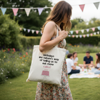 Cream tote bag with birthday quote and pink cake graphic, carried outdoors