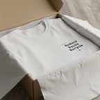 Unisex white T-shirt in box with crew neck and Reduce Reuse Recycle graphic