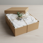 White hooded sweatshirt with lion Stay Humble graphic, folded in a gift box
