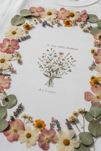 Personalised white t-shirt with floral wreath and "In my own season" text, Ava London name