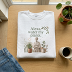 White crewneck sweatshirt flat lay with 'Alexa, water my plants' plant graphic