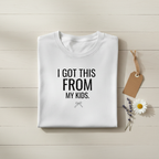 White crew-neck T-shirt with "I GOT THIS FROM MY KIDS" text, flat lay