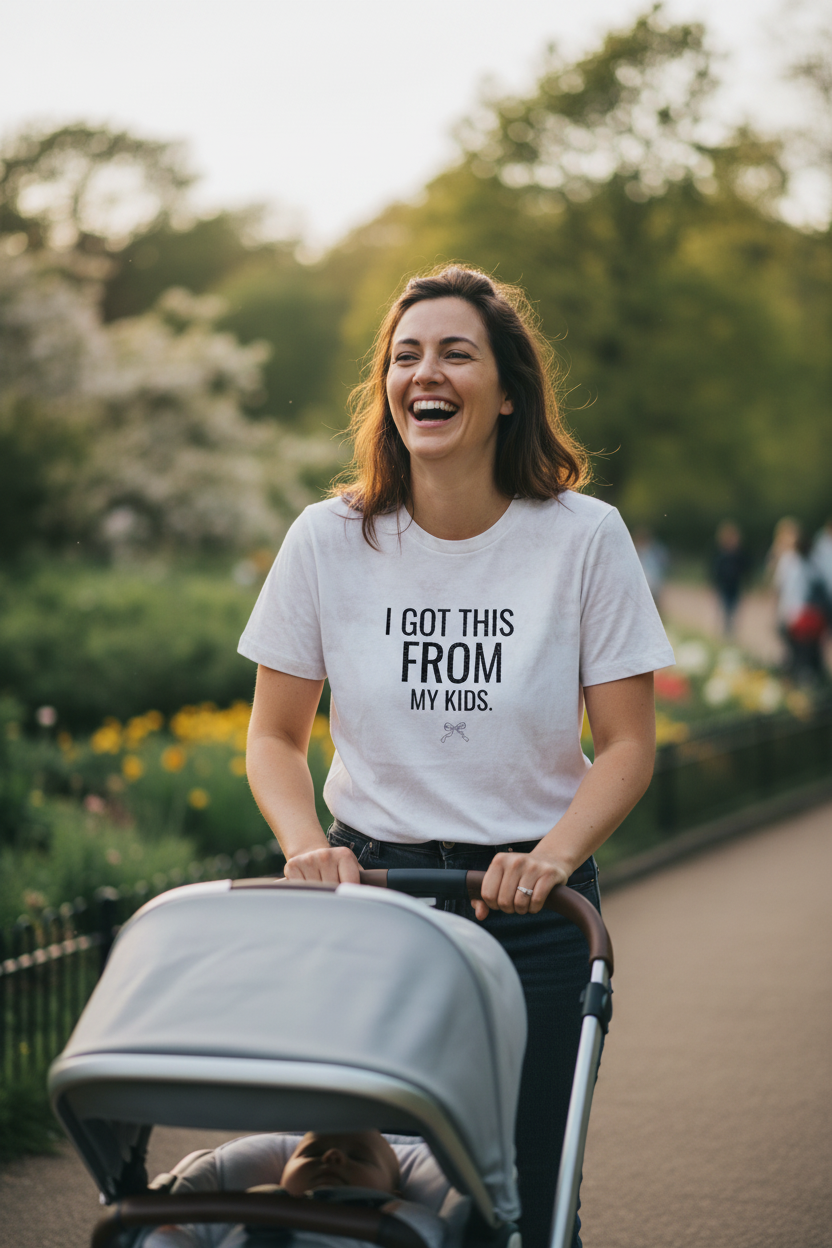 White graphic T-shirt with 'I GOT THIS FROM MY KIDS.' print on front