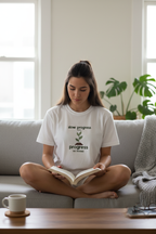 White motivational t-shirt with centered plant and “slow progress” progress slogan