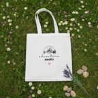 White canvas tote bag with mountain sketch, 'adventure awaits' text and pink heart