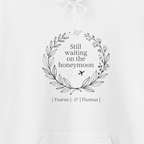 White personalized couples hoodie with centered wreath design and names printed on front