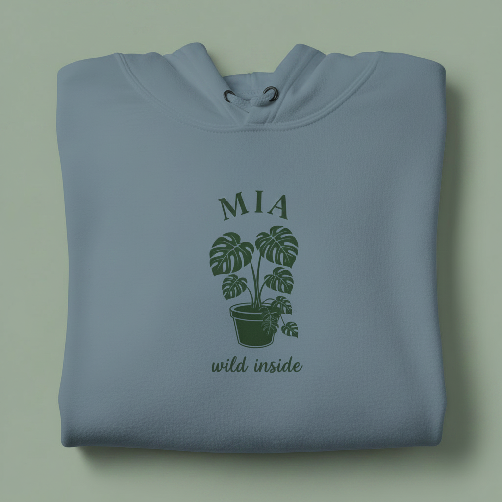 Light blue hoodie with front hood and eyelet drawstrings; potted palm graphic with “MIA”.