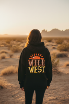Black hoodie back view with orange "WILD WEST" graphic and flame emblem.