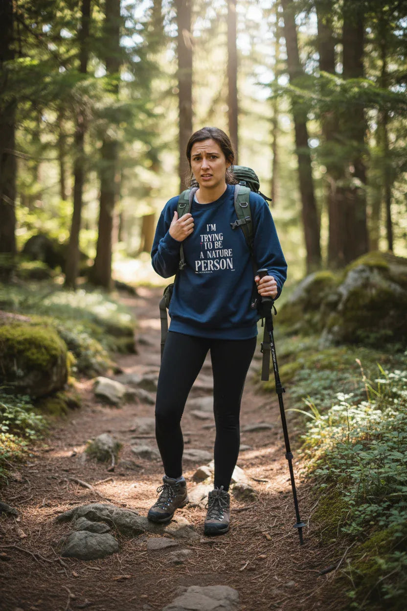 Dark blue crewneck sweatshirt with 'I’M TRYING TO BE A NATURE PERSON' front text