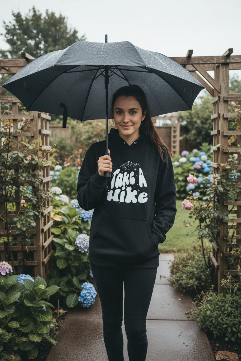 Black Take a Hike hoodie with hood and front Take a Hike mountain graphic.