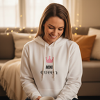 White hooded sweatshirt with pink crown logo and “MINI QUEEN” front print