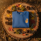 Royal blue crewneck sweatshirt with peace sign hand embroidery