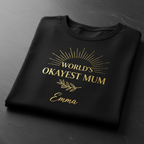Black personalized t-shirt with gold “World’s okayest mum” front design