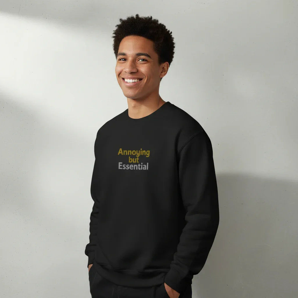 Black sweatshirt, crew neck with “Annoying but Essential” slogan print on chest