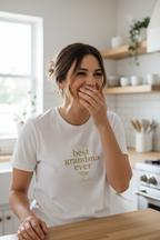 White personalized t-shirt with gold “best grandma ever” sunburst graphic