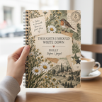 Zoomed-in UGC mockup of the Holly notebook at a cafe
